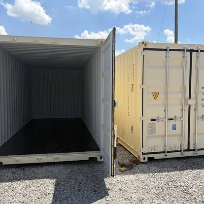 Open shipping container showing interior and door access
